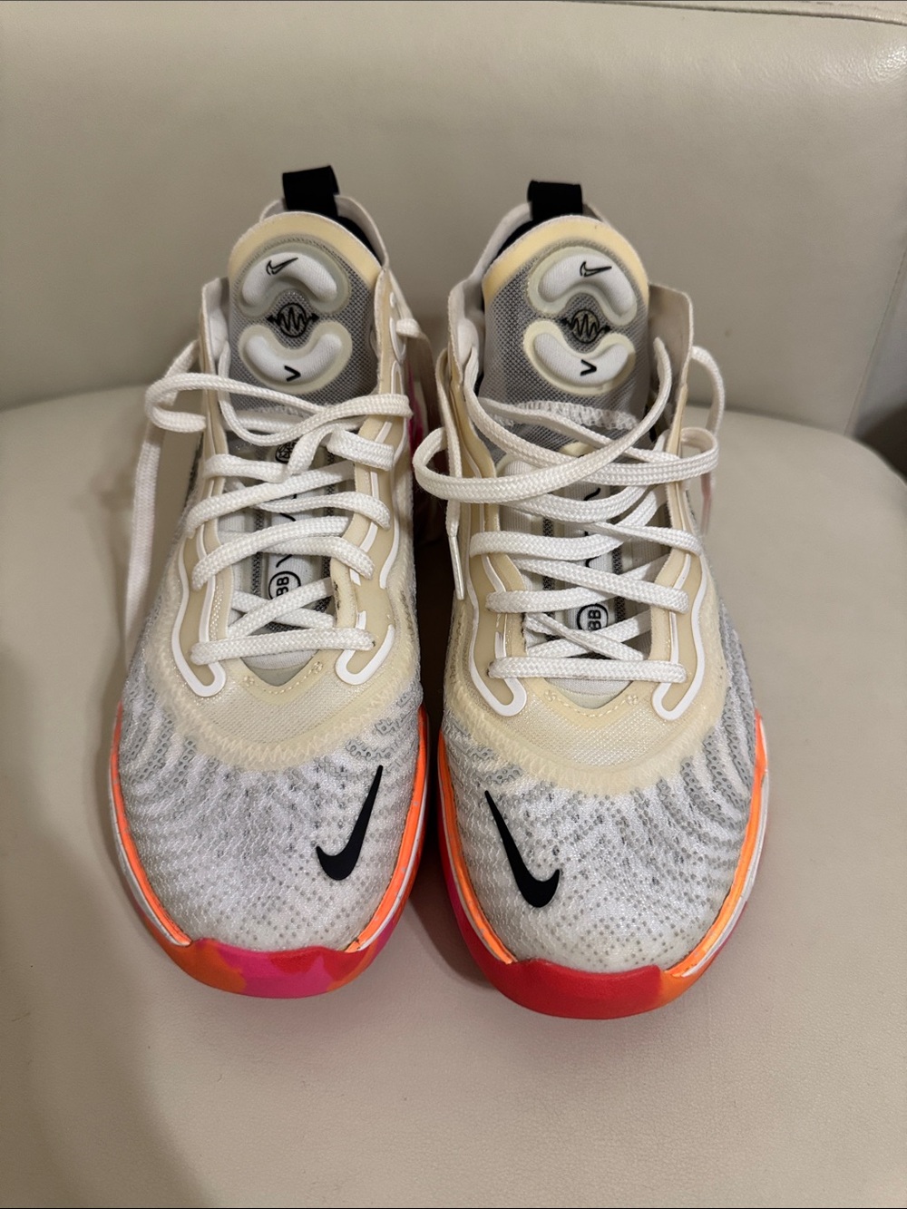 Nike White Knit Sneakers with Pink and Orange Accents